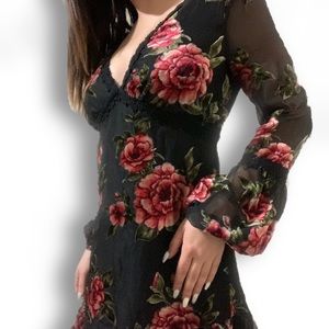 black dress with  velvet red rose detailing